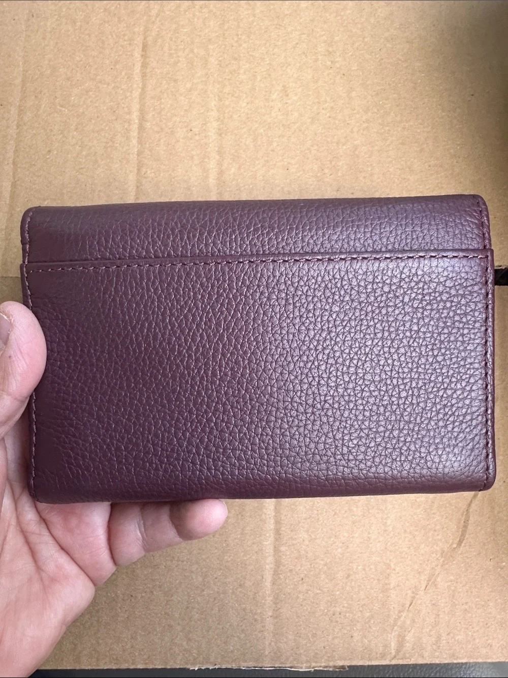 Dooney & Bourke compact pebbled